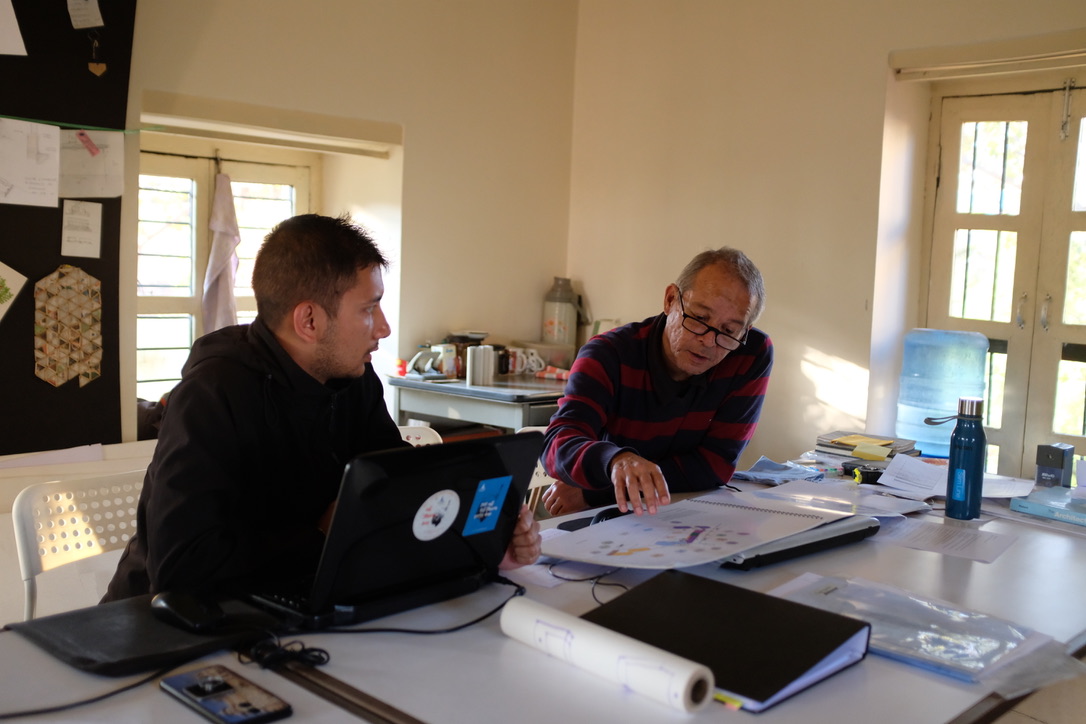 Architect Mr Prabal Thapa instructing Field Architect Mr Shirshak Baniya on implementing master plan of PBM&LC at his office in Naxal, Kathmandu.